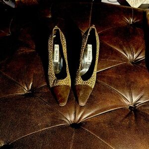 Baldan cheetah heels 38 1/2 I believe 8 1/2